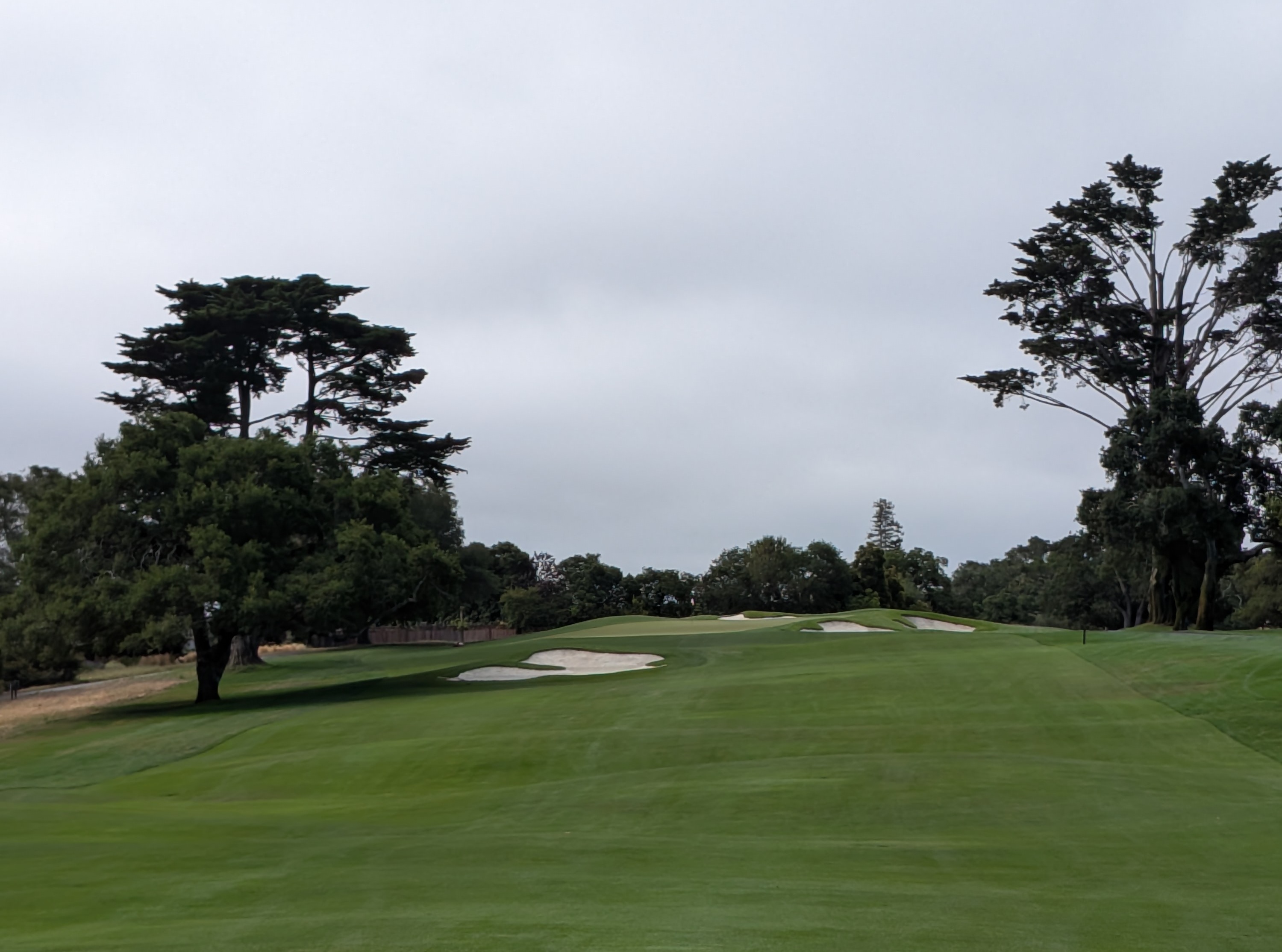 The approach shot at the first hole at Pasatiempo Golf Club